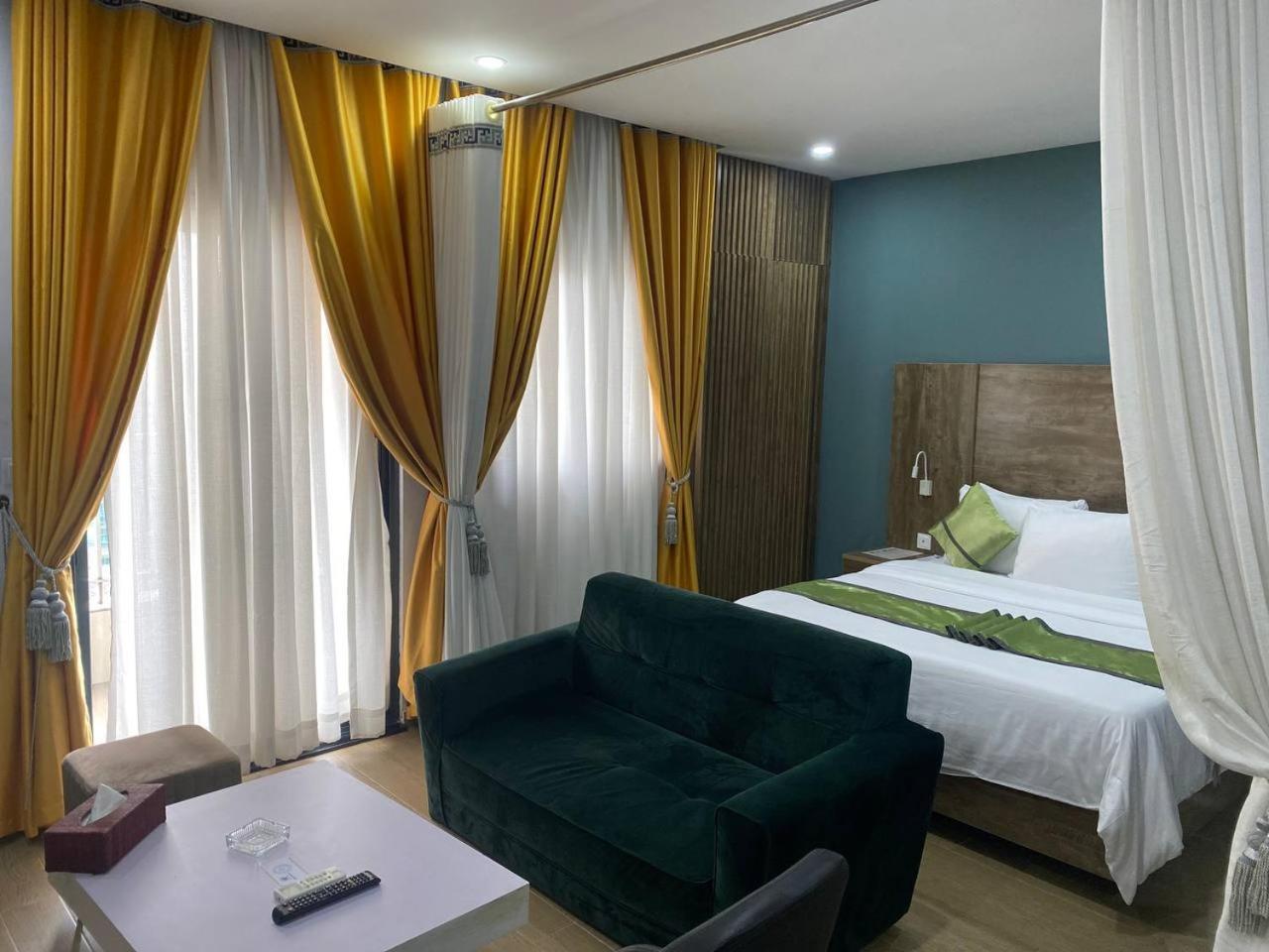 Bano Palace Hotel Douala Buitenkant foto